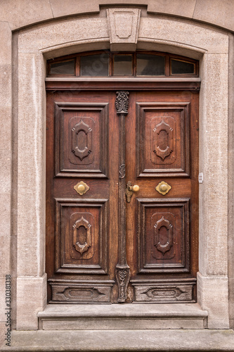 Old wooden door of an old historical building