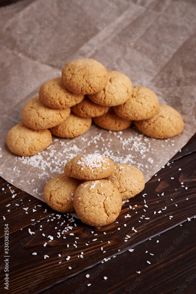 Lean cookies with coconut on a brown background