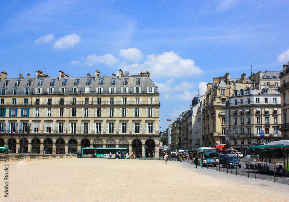 Facades of houses in a European town in summer - Paris, France 