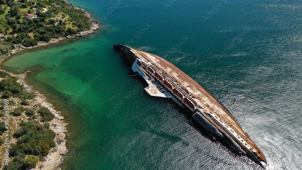 Aerial drone photo of shipwreck passenger ship sunk near shore in Mediterranean sea
