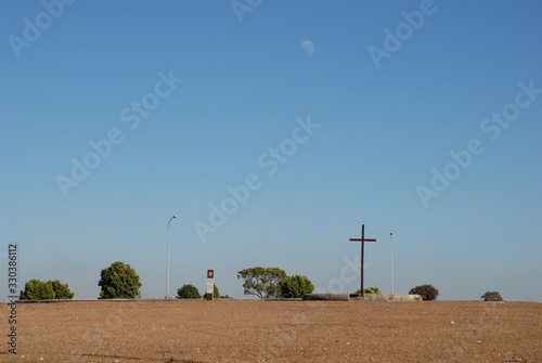 Moon over Brasilia's Cross