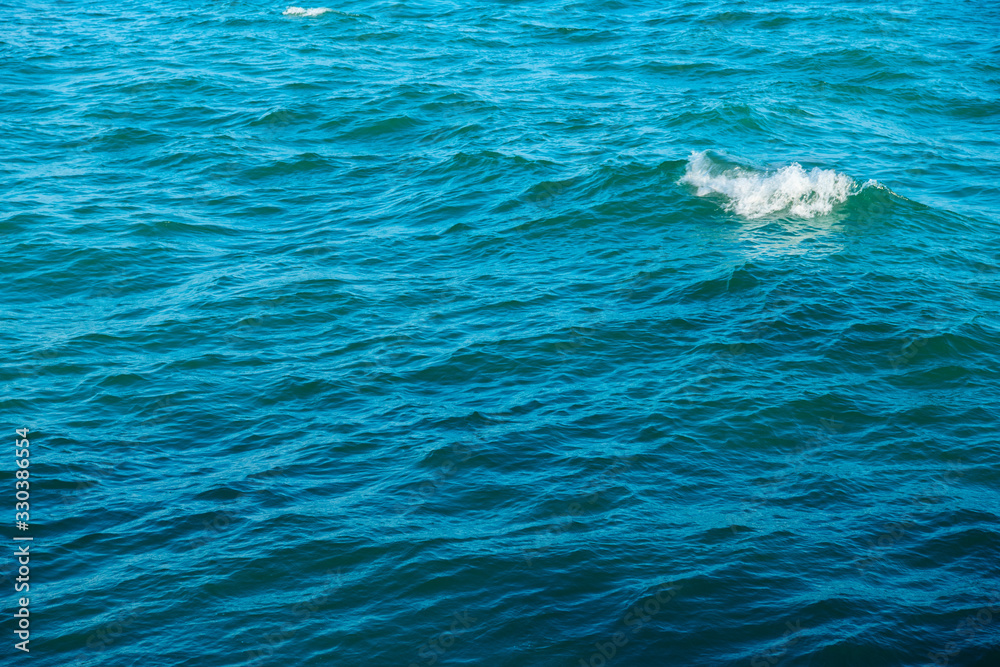 Obraz premium Blue sea water background texture