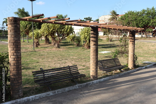 Garden bench in Ceci Cunha square, Arapiraca city, Brazil. photo