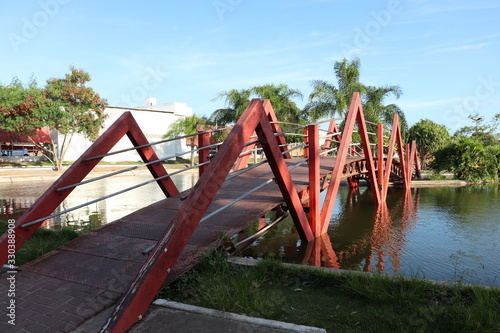 Iron bridge over the lagoon of Ceci Cunha square, Arapiraca city, Brazil. © De Oliveira Franca