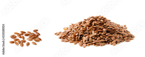 Flax seeds heap isolated on white photo