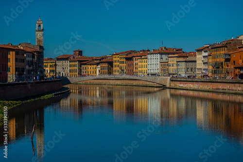 Pisa in Tuscany, view the river Arno with bridge in historical center