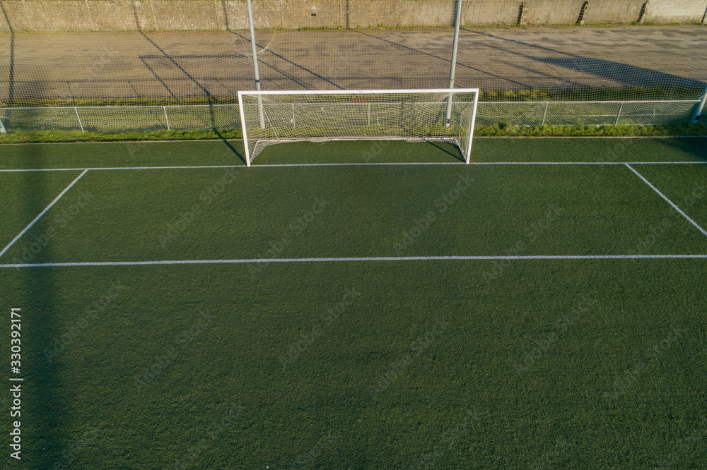 Fototapeta premium Aerial view of football field goal
