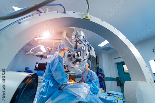 Modern automated medical device. Surgical room in hospital with robotic technology equipment, machine arm neurosurgeon. Neurosurgery machine closeup.