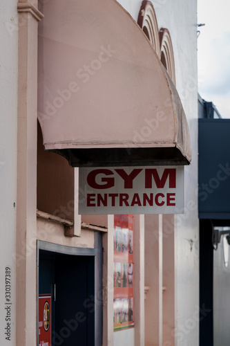 Gym Entrance sign above door photo