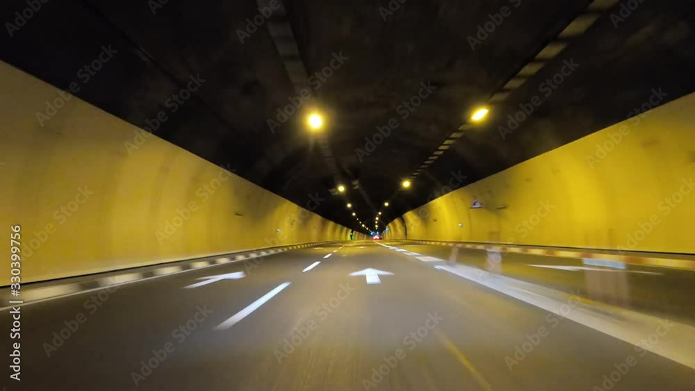 Tunnel Driving : Car driving through a road tunnel. Tunnel Driving : Car driving through a road tunnel.