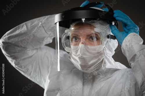 Female Medical Worker Weari...