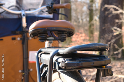 E-Cargo bike close up in nature with focus on battery