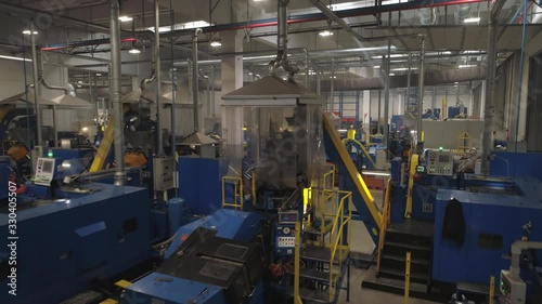 Flying through the big factory warehouse.
