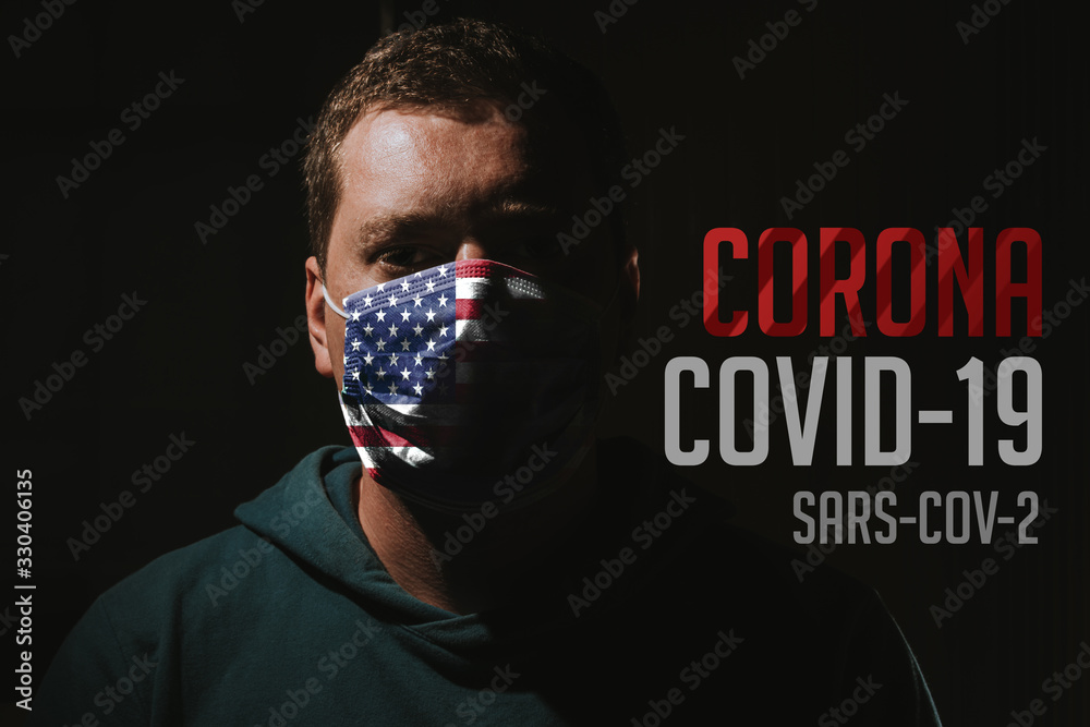 man wearing mask with American flag for protection of corona virus covid-19 SARS-CoV-2