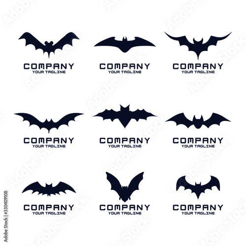 Bats icon.Black silhouettes of bats set on white background.