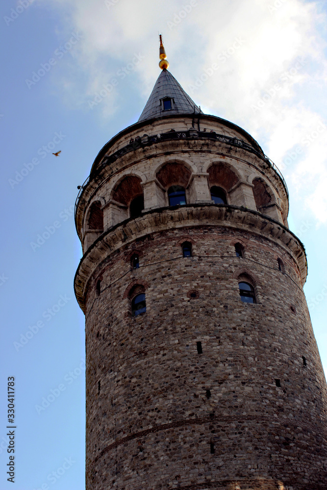The Galata Tower — called Christea Turris  by the Genoese — is a medieval stone tower in the Galata/Karaköy quarter of Istanbul, Turkey, just to the north of the Golden Horn's junction with the Bosph