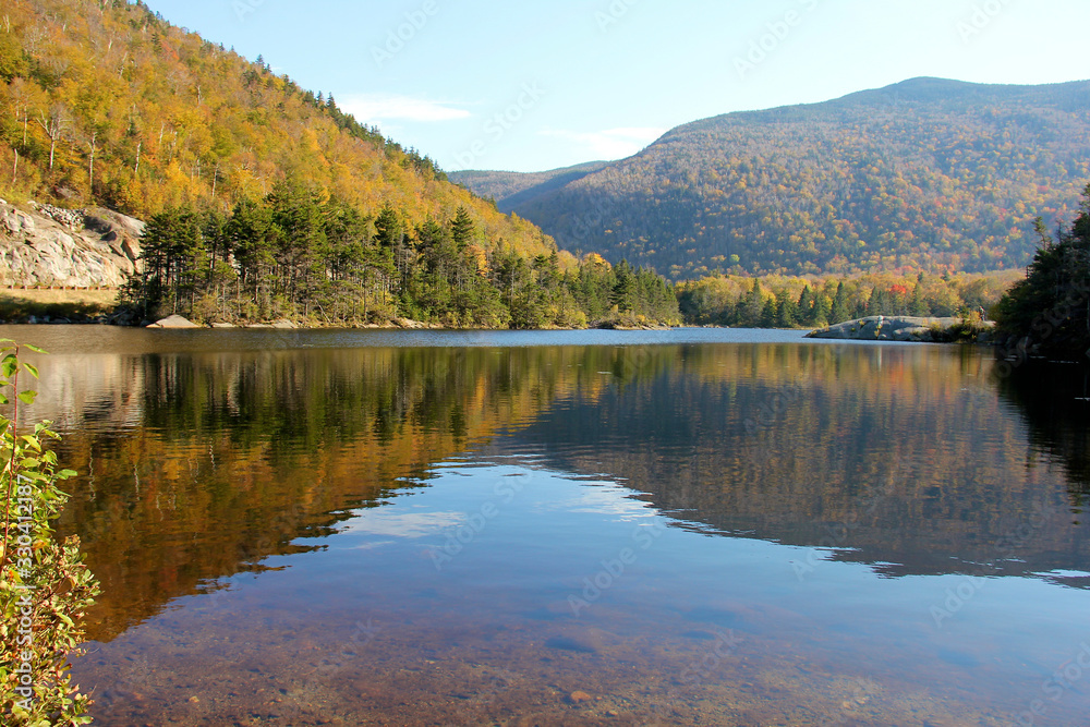 Lake at the base of mountains in New Hampshire, USA