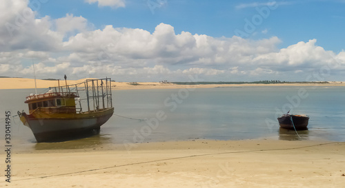 Two small boats anchored on one of the beaches in Fortaleza  Brazil