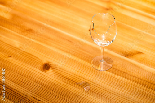 Chip on the rim of wineglass