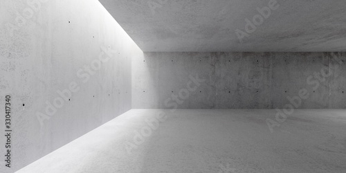 Abstract empty, modern concrete walls hallway room with indirekt ceiling light on the left and rough floor - industrial interior background template
