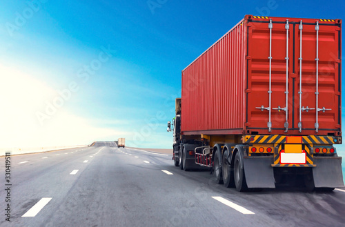 Truck on highway road with red container, transportation concept.,import,export logistic industrial Transporting Land transport on the asphalt expressway with blue sky