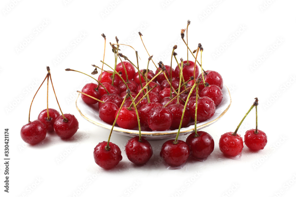 Red cherries on dish Red cherries on dish