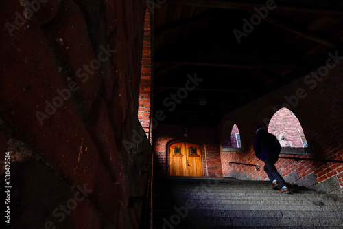 Photography Stockholm, Sweden  A man climbs the stairs at the Royal Institute of Technology