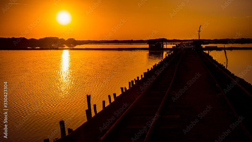 old wooden pier at sunset