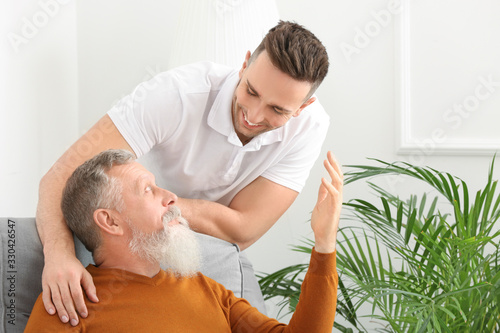 Portrait of senior man and ...