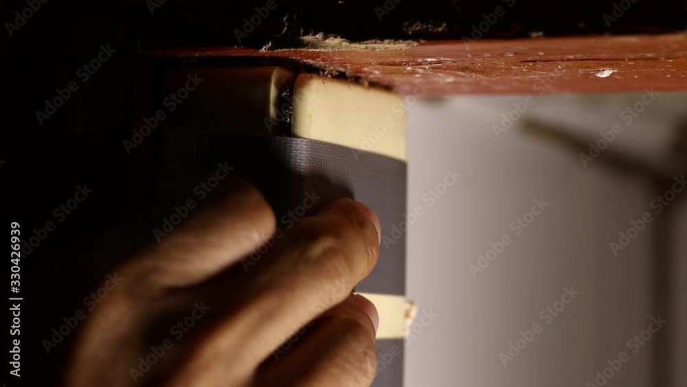 Termite elimination staff is pointing the termites to destroy wooden