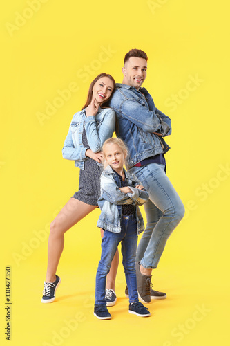 Happy family against color background