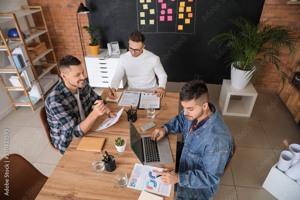 Group of men working in office Group of men working in office