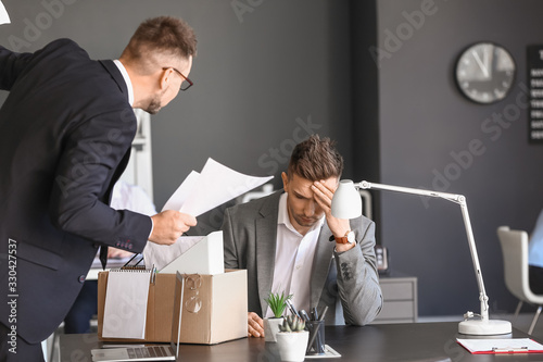 Angry boss firing office wo...
