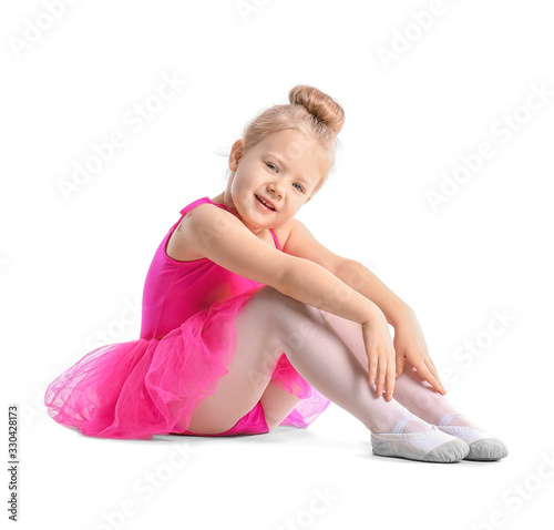 Cute little ballerina on white background