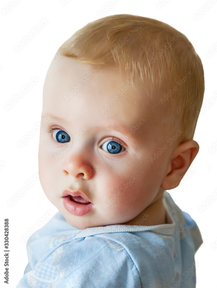 Portrait of a cute pretty blue-eyed redhead infant boy