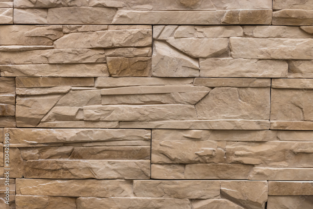 Obraz premium Brown large decorative facing brick texture, background