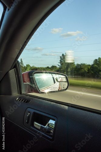 driving a car mirror © Parker