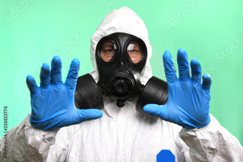 Lab Technician Wearing Gas Mask Working on Virus Vaccine