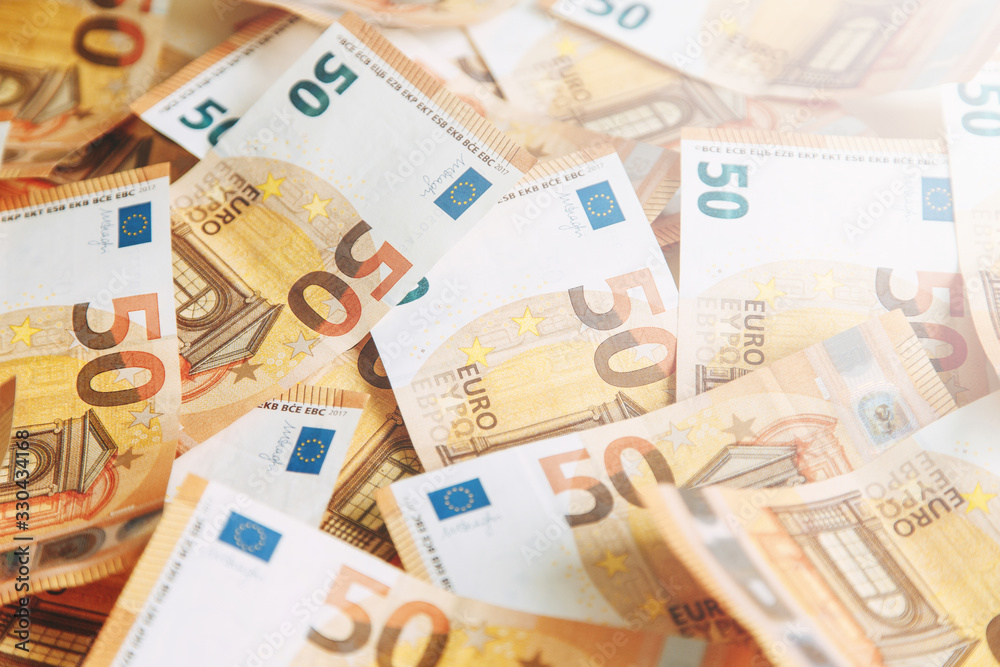 Layout of money on a white background Flatley. Paper money account in Europe. 50 Euro banknotes. Layout of money on a white background Flatley. Paper money account in Europe. 50 Euro banknotes.
