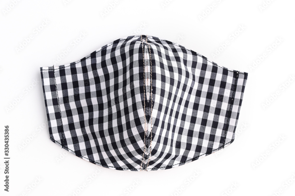 face mask handmade from fashion fabric cloth isolated on white background face mask handmade from fashion fabric cloth isolated on white background