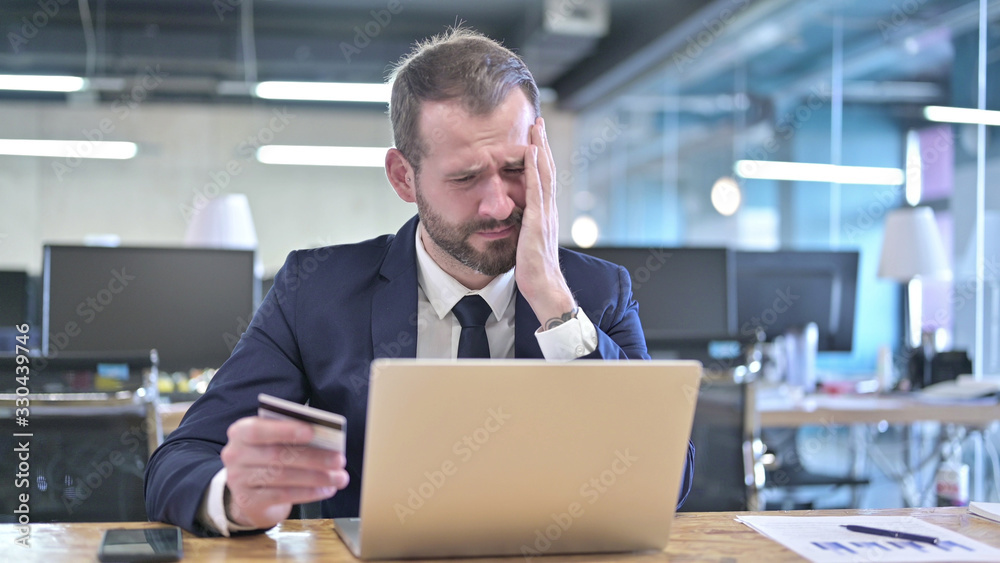 The Fail Online Shopping by Businessman, using Credit Card on Laptop The Fail Online Shopping by Businessman, using Credit Card on Laptop
