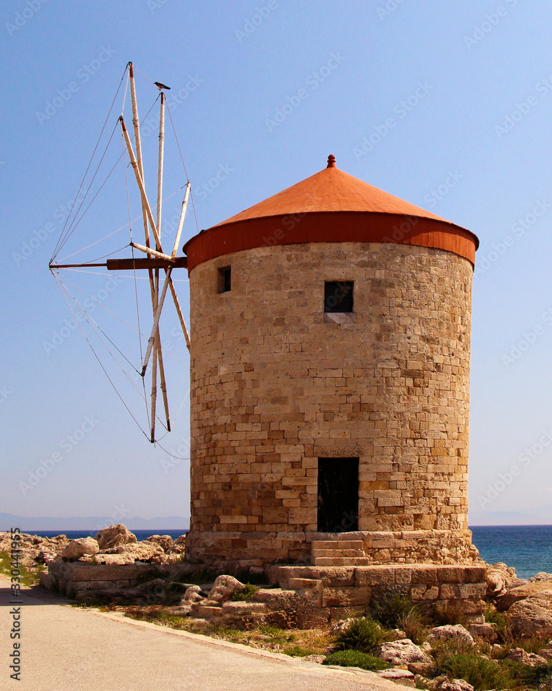 Windmills in Mandraki harbour, Rhodes, Greece