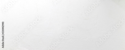 Panorama blank concrete white rough wall for background. Beautiful white wall surface background pattern. photo