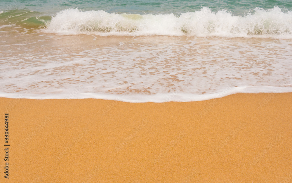 wave on a sandy beach