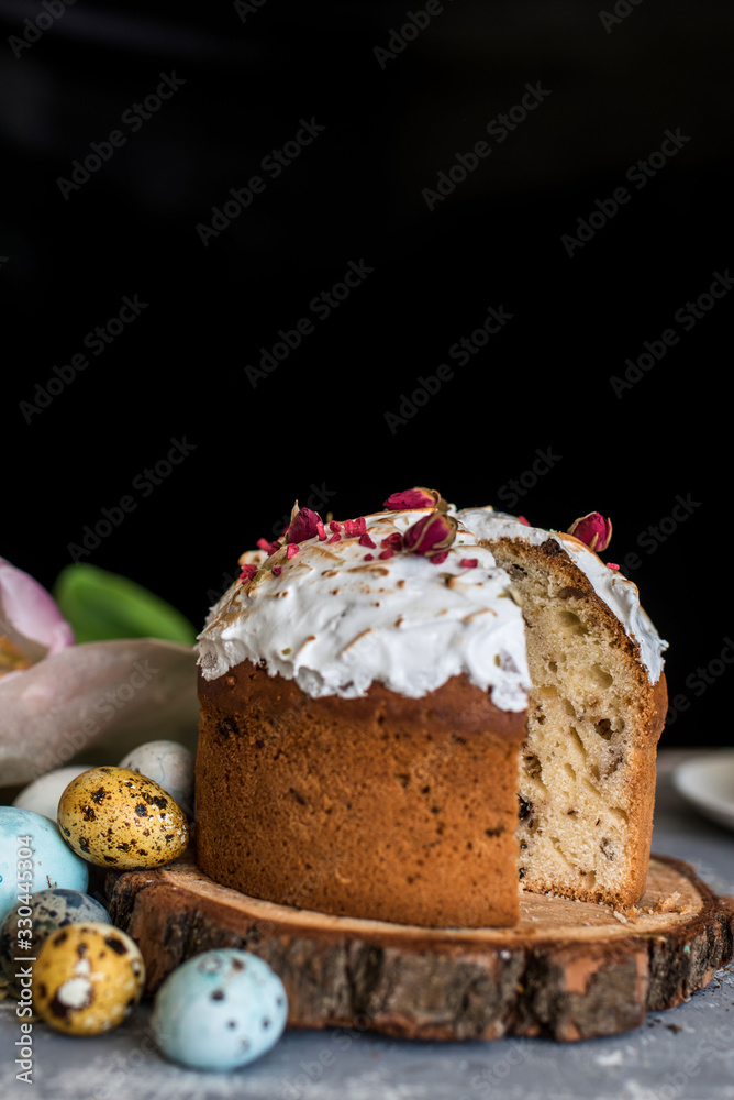 Easter composition with sweet bread, kulich and eggs on light background. Easter composition with sweet bread, kulich and eggs on light background.