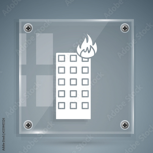 White Fire in burning building on city street icon isolated on grey background. Square glass panels. Vector Illustration