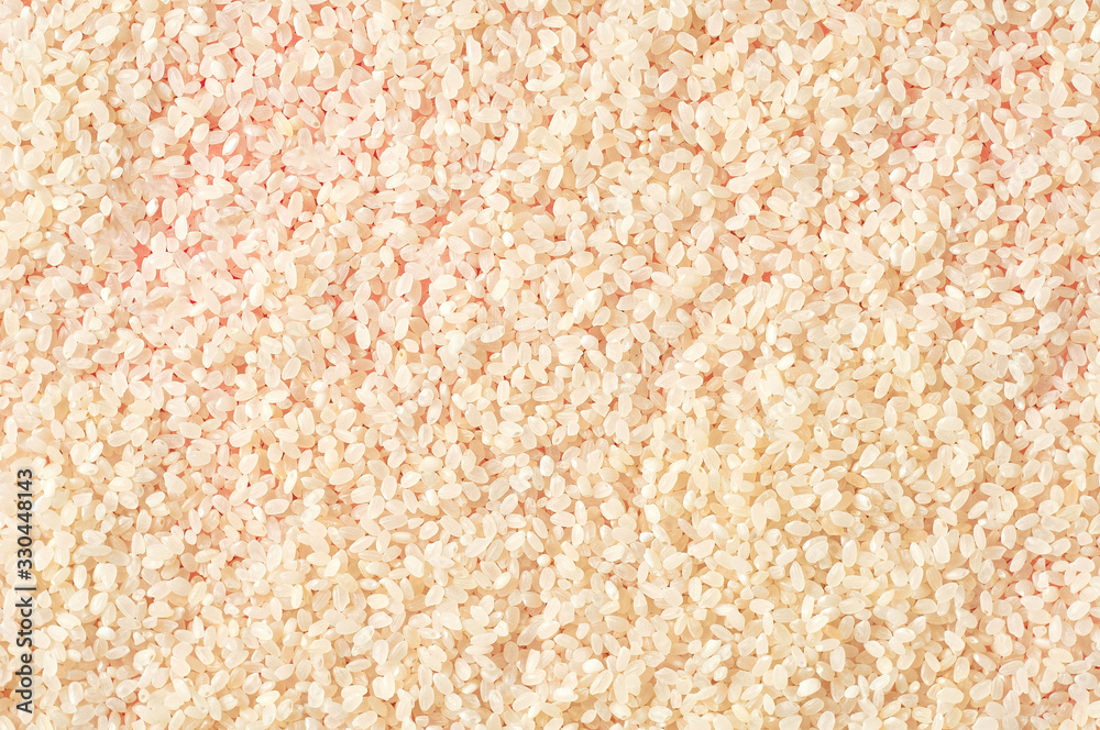 Scattered grain of white rice. Background. Top view Scattered grain of white rice. Background. Top view