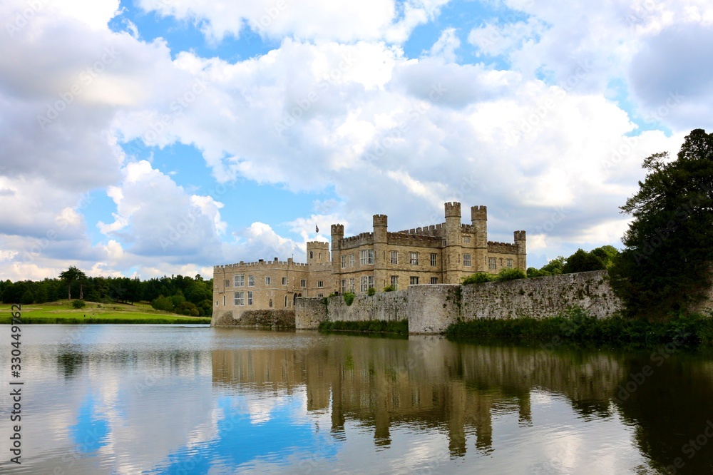 Leeds Castle, England. It is built on islands in a lake formed by the River Len to the east of the village of Leeds.
