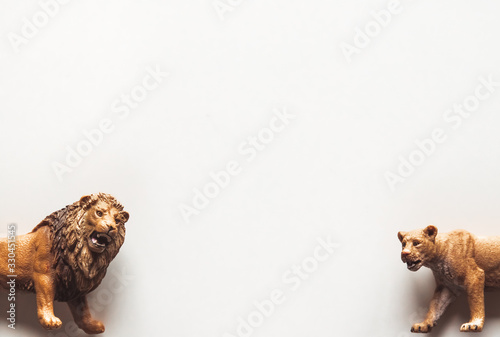 Brown Plastic Toy Lion on White Background