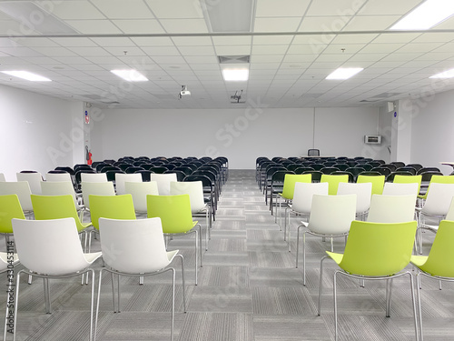 Empty clean room with chairs and tables for training,meeting 